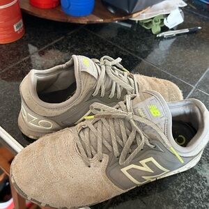 New Balance men’s/boys  - Gray and Yellow Turf shoes 7.5 baseball